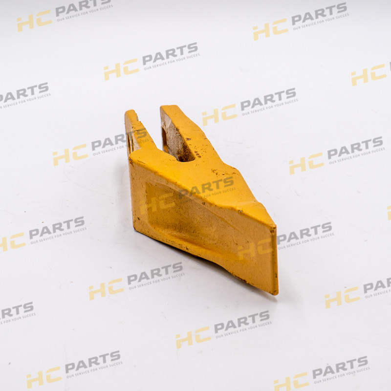 CAT Center зуб — экскаватор-погрузчик